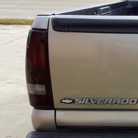 AmeriLite for 1999-2002 Chevy Silverado | 99-2006 GMC Sierra Truck Smoke Red Replacement Brake Tail Lights Pair - Passenger and Driver Side