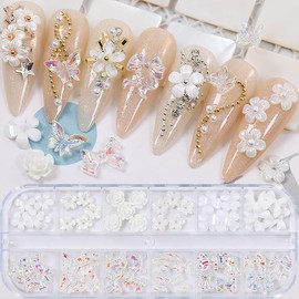 12 Grids 3D Flower Nail Charms Colorful Bling Crystal Nail Rhinestones Nails Art Charms Aurora Butterfly Bows Nail Supplies for Acrylic Nails Bow Charms for Nails White Flower Design Manicure Decor