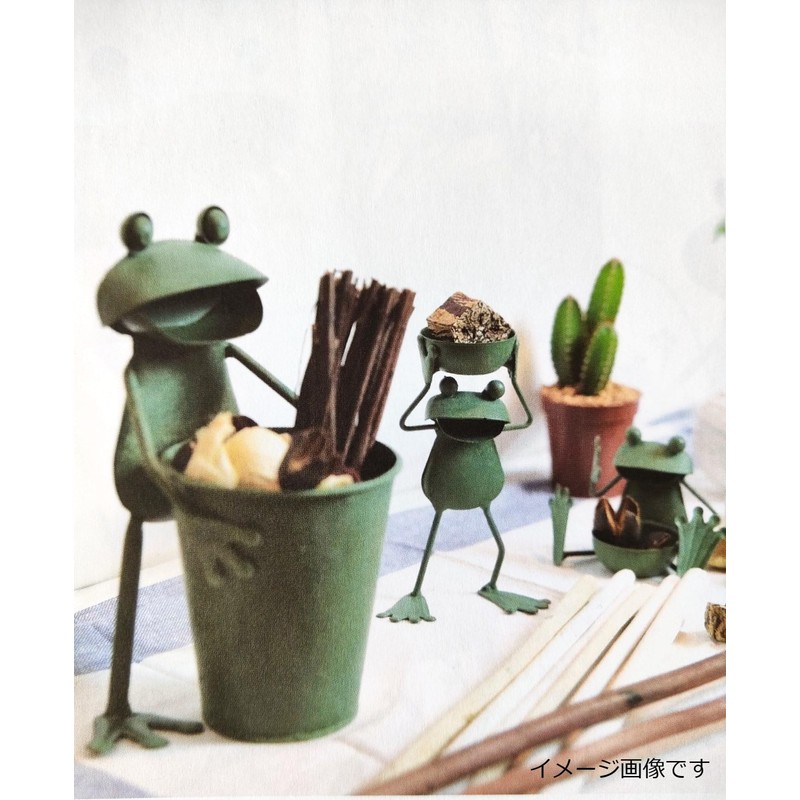 It. He's an Industrial Figurine/Object Green Approx. 12 × 24