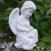 Little Angel with Consolation Teddy Holding in Arms.
