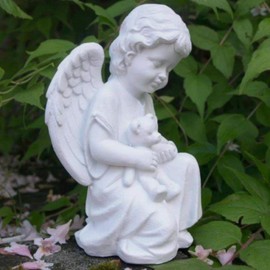 Little Angel with Consolation Teddy Holding in Arms.