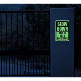 Glow In The Dark Slow Down This is not a Racetrack, Slow Down Sign 8 x 12 Inches - Sturdy Acrylic Glow Signs - For 50 Feet Visibility