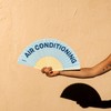 Fisura - Original hand fan with the inscription "air conditioning".