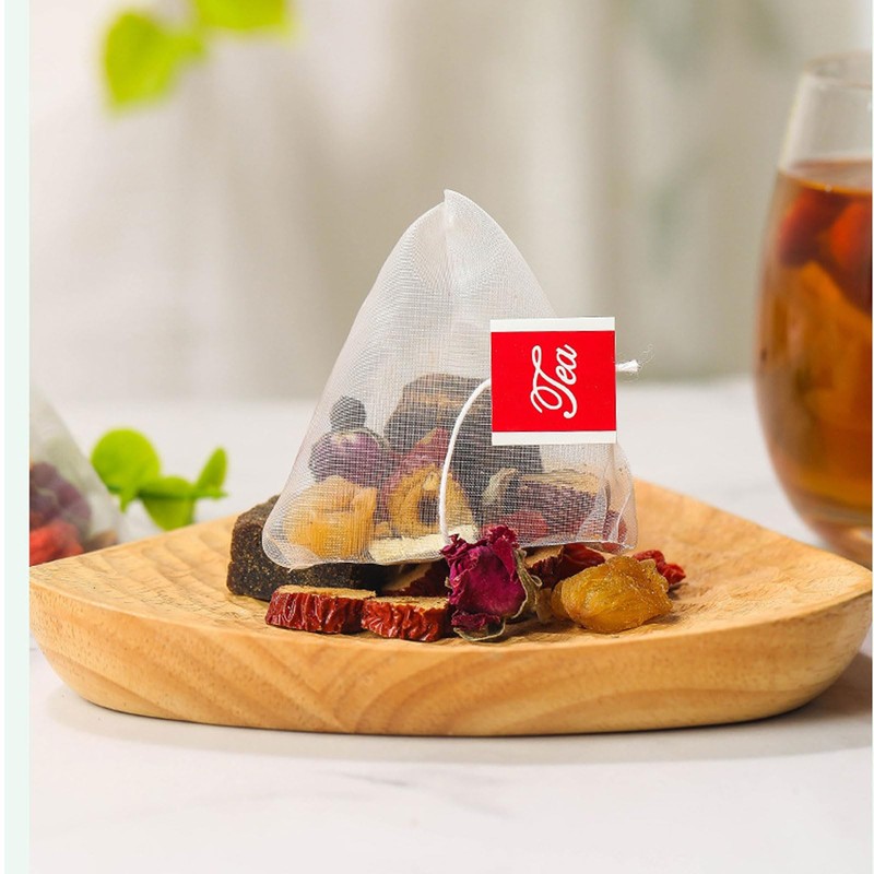 Black sugar ginger tea, independent triangular bag, red dates, cinnamon,