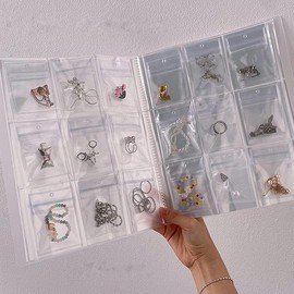 288 Grids Transparent Jewelry Storage Book - Comes with 100 Zipper Bags. Portable Travel Jewelry Organizer for Rings, Necklaces, and Bracelets