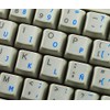 Spanish (Latin American) Keyboard Sticker with Blue Lettering Transparent Background