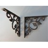 Pair of small cast Iron wall mounted antique style leaf