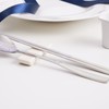 Pristine pastel-colored premium quality domestic cutlery set with good grip,