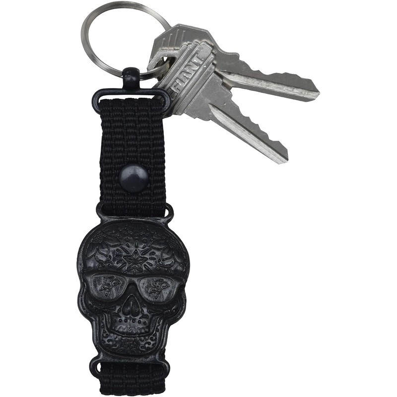 Llavero metálico con la figura de una calavera alusiva al