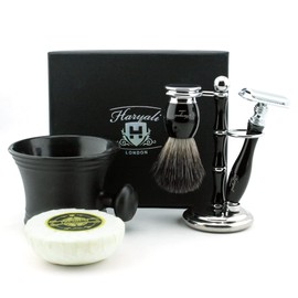 Pure black badger hair shaving set in black. The includes shaving brush, De safety (blades not included), shaving brush and holder, cup with soap. This is a perfect gift for