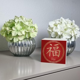 Chinese sign of luck money box made of wood in red beautiful money box with lettering decorated with Chinese patterns