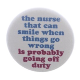 A&T Designs nurse that can smile - getting off duty 2.25" Keychain Nursing Humor