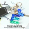 Zesirmay Initial letter Keychains, Sparkly Glitter Letter Keychain with Tassel,Resin