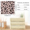 Paños de cocina con estampado de leopardo rosa y negro,