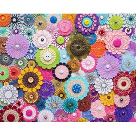 Springbok's Bloomin Buttons 1000 Piece Jigsaw Puzzle for Adults by artist Linda Stewart Features a Photo of a Floral Composition made from Buttons and Paper