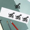4 x Small 50mm 'Dinosaur on a Bicycle' Transparent/Clear Sticker