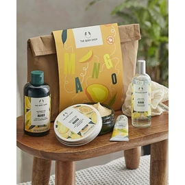 The Body Shop Mango Geschenkset – veganes Pflegeset mit Duschgel 250ml, Körperbutter, Körperspray, Handcreme & Luffaschwamm – tropischer Duft – Geschenk für Frauen