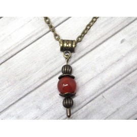 Necklace with vintage style pendant for woman in red carnelian mounted on an antique bronze chain