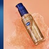 Vaseline Illuminate Me - Aceite Corporal Brillante para Pieles con