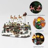 MOMENTS IN TIME 10.5”H Polyresin Christmas Village with Music and