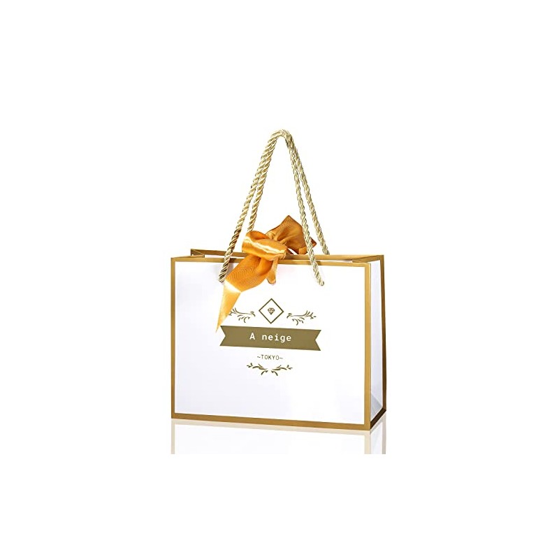 A neige Gift Bag with Gold Ribbon