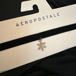 Aéropostale Aeropostale Gold Tone Rhinestone Snowflake Pendant Black Ribbon Choker Necklace