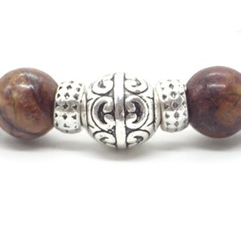 Ethnisches Armband für Männer aus Picasso-Jaspisperlen und zentraler Perle aus silbernem Metall