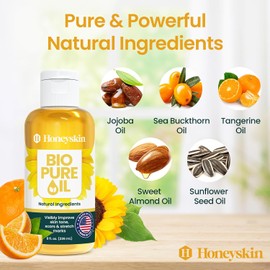 Honeyskin- ACEITE CORPORAL RESTAURADOR PARA CICATRICES Y ESTRÍAS: este aceite corporal orgánico rico en vitaminas penetra profundamente en la piel para reducir visiblemente la apariencia de cicatrices