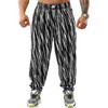 Men's Baggy Sweatpants, Loose Fit Gym Workout Pants with Pockets,