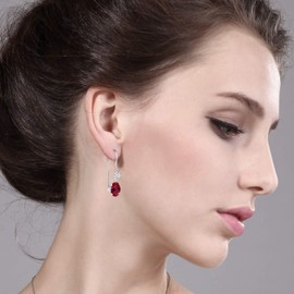 Gem Stone King 14K White Gold Red Created Ruby French Wire Dangle Earrings For Women (1.10 Cttw, Gemstone July Birthstone, Oval 6X4MM and Round 2.5MM)