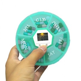 Don't forget to carry a timer, pill case, and alarm for each day of the week. vitamin container 7ea