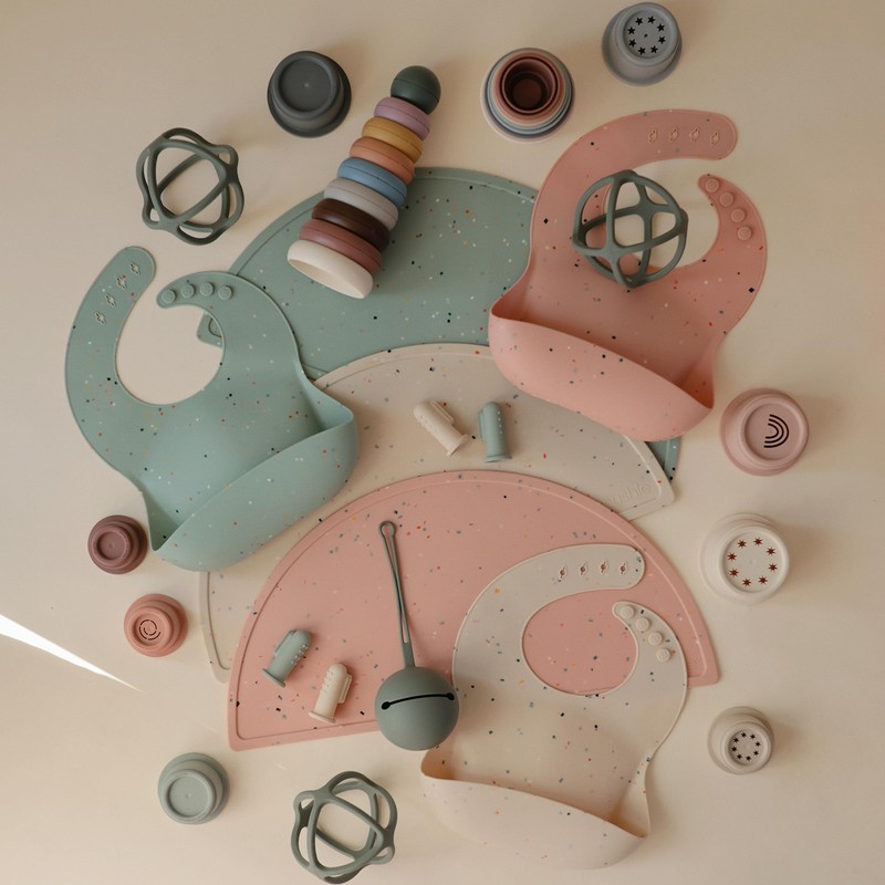 mushie Silicone Baby Bib | Adjustable Fit Waterproof Bibs (Powder