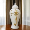 Homeroots 14" White and Gold Floral Urn Ceramic Ginger Jar