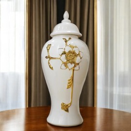 Homeroots 14" White and Gold Floral Urn Ceramic Ginger Jar With Sculptural Details