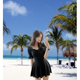 This Pick: Body-Flattering Shirred Cover-Up One-Piece Monokini Black L