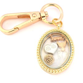 PAW Memory Locket. Paw Print, White Heart, Angel, Love, Rose Flower Floating Charms inside Gold colour Oval Locket. Keyring Keychain