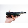 Guiro music percussion instruments wooden sound block animal croaking Alligator