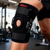 Wilson AW206S Rodillera con Bisagras Mediano, Color Negro