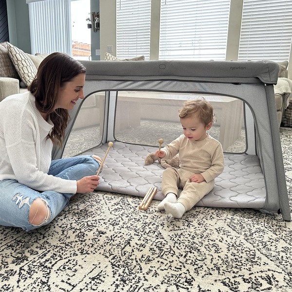Newton Baby Travel Crib and Play Yard - 100% Breathable & Washable Portable Playpen for Babies | Largest-in-Class Surface Area | Baby Portable Playard Crib with Bassinet Mattress, Travel Bag & Sheet