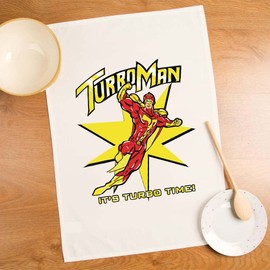 SMARTYPANTS Turbo Man Tea Towel - Jingle Bells Action Figure Man Comedy Festive Xmas Christmas Eve Classic Movie Film Cinema Home Kitchen Accessories Gift Bags Presents (Natural Prime)