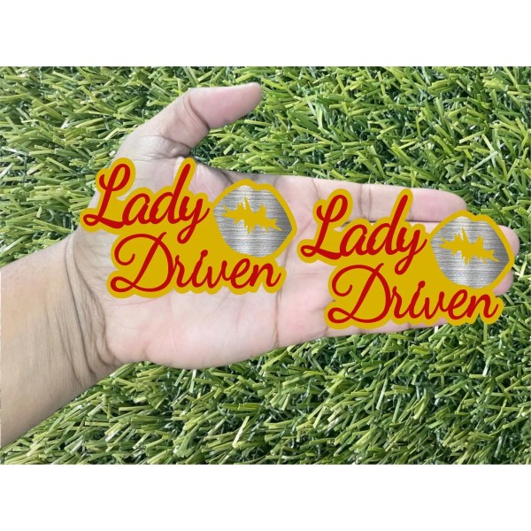 Badge Addictz Red Lady Driven Silver Lips on Yellow Emblem