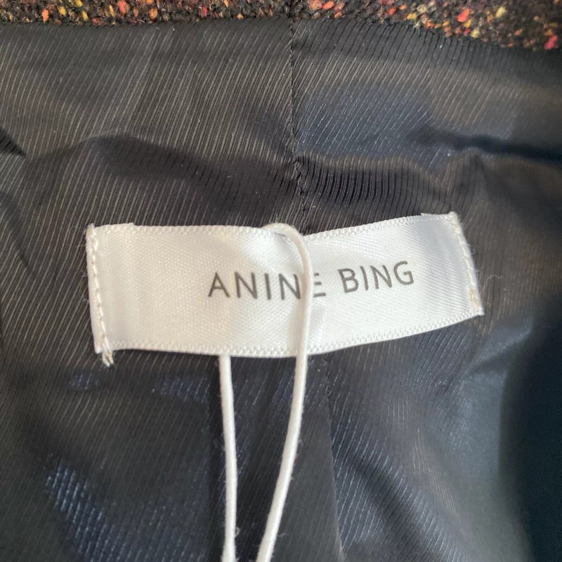 Anine Bing features double breasted closure with a cropped, boxy