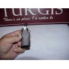 STURGIS KEYCHAIN THAT HOLDS CHAP STICK OR BIC CIGERETTE LIGHTER