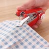Blue Handheld Mini Sewing Machine,Easy to Use and Fast Stitch
