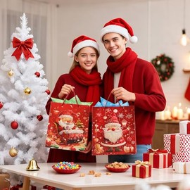 Rusikia Mini 12 Christmas Gift Bags with 12 Tissues Paper 1 Satin Ribbon, Red Party Favor Bags Bulk with Handles, Glittery Cute Father Christmas Goodie Bag for Wrapping, Present (Small 9"x7"x3")