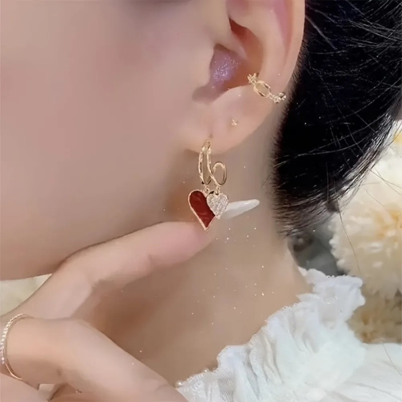 Distinctive Heart-Shaped Dangling Earrings with a Glossy End, Elegantly Easy