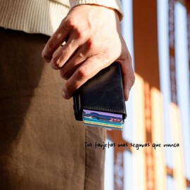 WEXLER Cartera Slim con Protección RFID, Mecanismo Pop-Up de Tarjetas y Compartimento Mágico para Billetes, Diseño Moderno y Acabados Premium