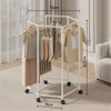 360° Rotating Clothes Rack for Bedroom Storage – Floor-Standing Iron