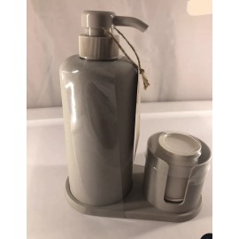 enHome mouthwash dispenser partially made with plant-based materials