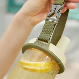 Elephant Cuppa Versatile Silicone Carrier Water Bottle Handle Holder Strap, Durable Clip, Adjustable & Fixed, Universal Fit, Colorful Design, Non-Toxic Silicone, Portable Lightweight Sling, Green